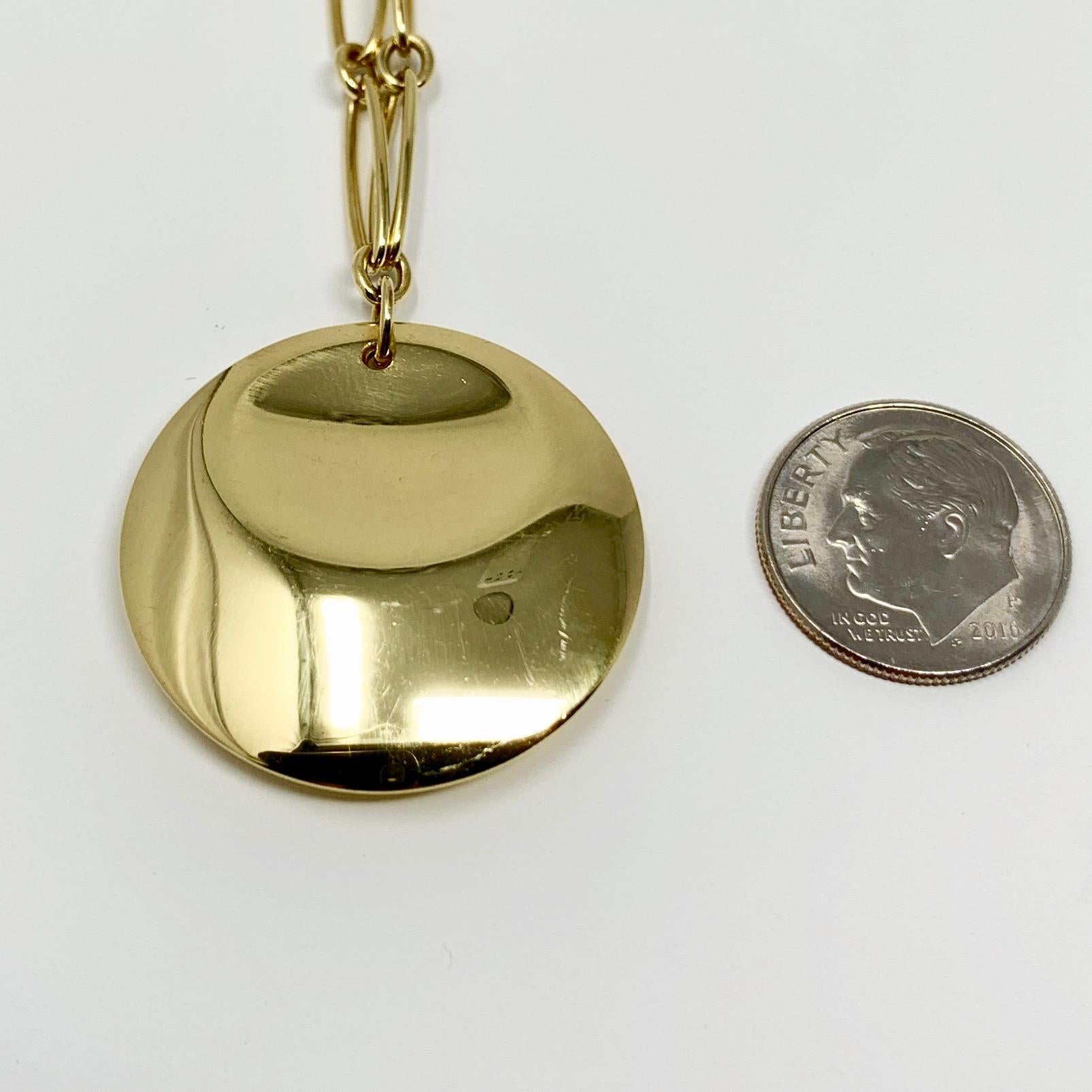 Tiffany & Co. Elsa Peretti 18 Karat Yellow Gold Round Pendant Necklace In Good Condition In Guilford, CT