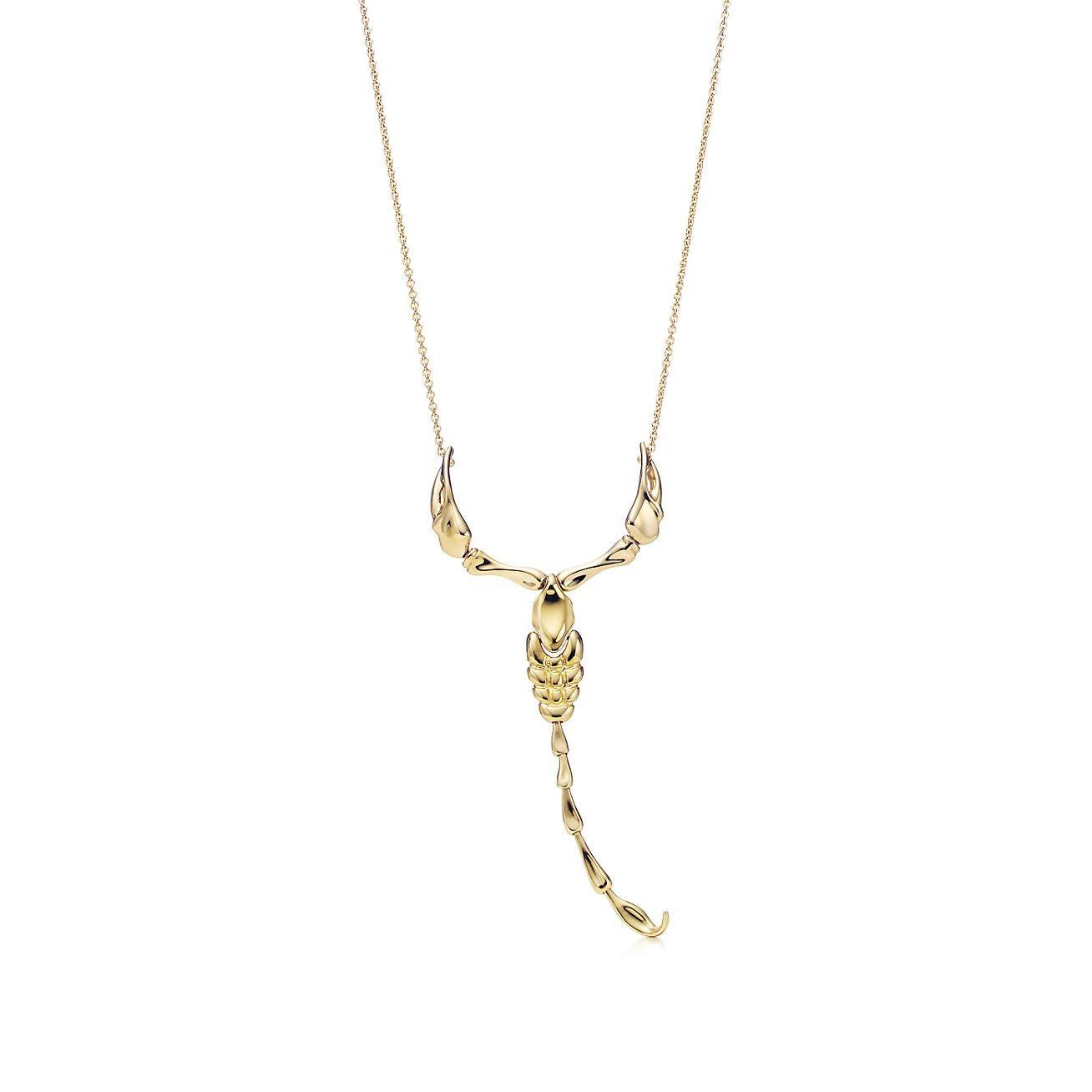 Tiffany & Co. Elsa Peretti 18k Yellow Gold Scorpio Zodiac Necklace w/Box & Pouch

Here is your chance to purchase a beautiful and highly collectible designer necklace.  Truly a great piece at a great price! 

The weight is 18.1 grams.  The length of