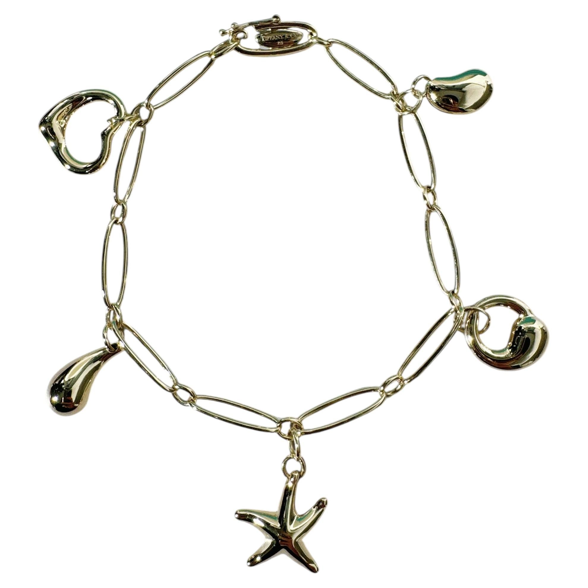 Tiffany & Co. Elsa Peretti 18‑K Yellow‑Gold Five‑Charm Bracelet For Sale