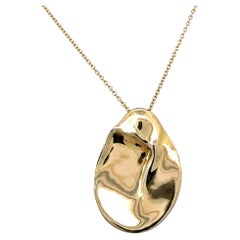 Tiffany & Co. Ciondolo Madonna in oro 18KT da 27,5 mm, lungo 28 pollici e con astuccio