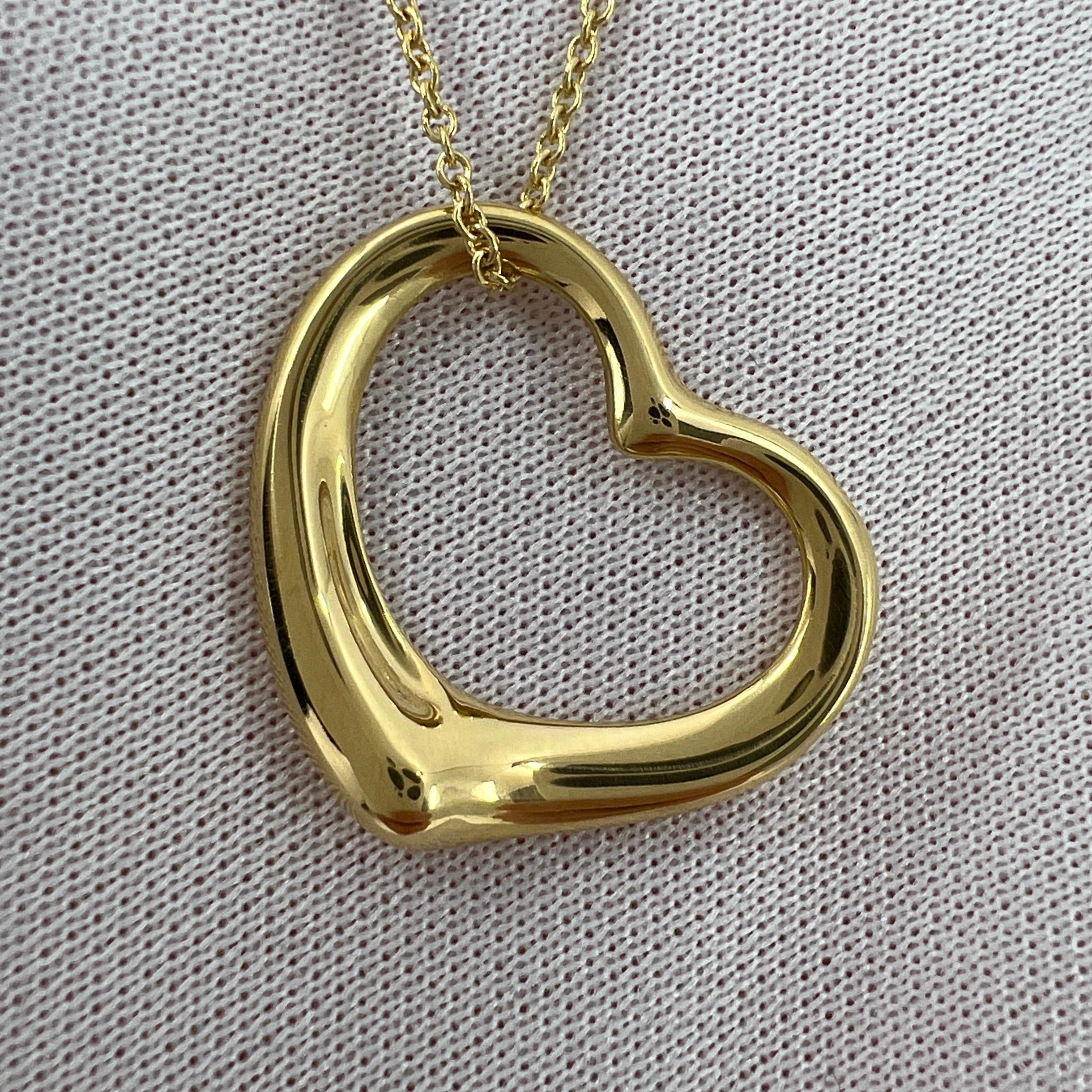 Vintage Tiffany & Co. Elsa Peretti Large Open Heart 18k Yellow Gold Pendant Necklace.

A beautiful and rare authentic Tiffany & Co large open heart pendant from the stylish and popular Elsa Peretti range. Extra large size pendant.

A rare variation