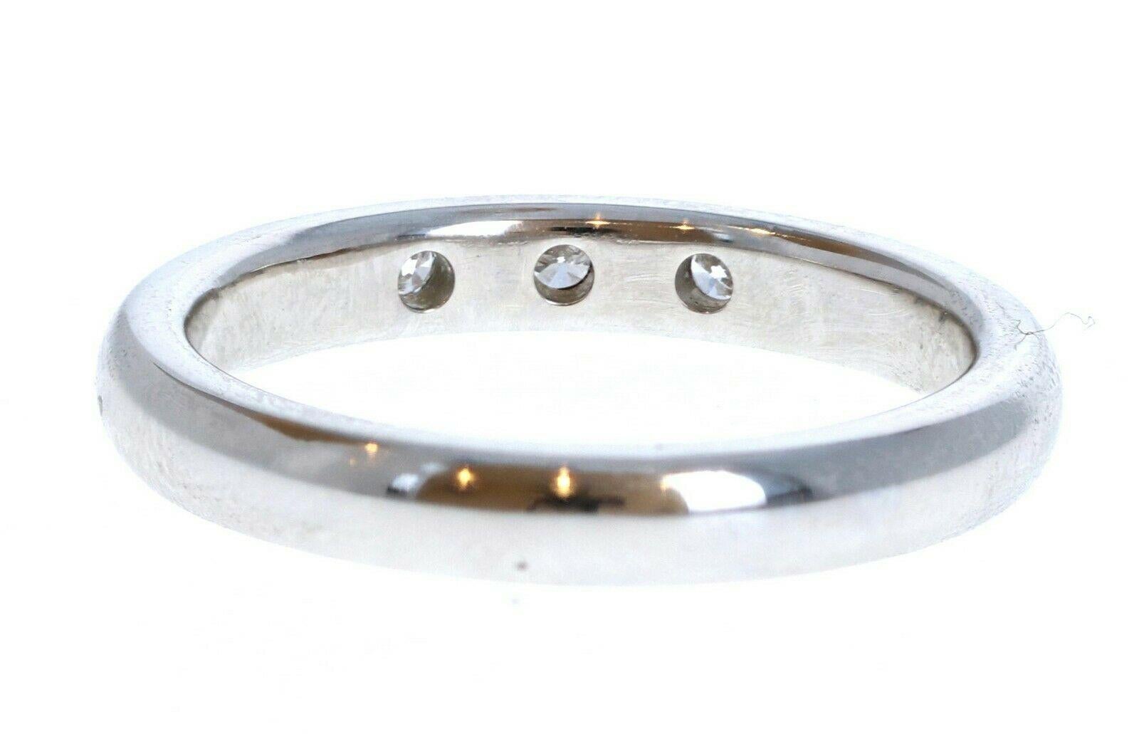 Tiffany & Co. Elsa Peretti 3 Diamond Stacking Band Ring 2.7mm Size 4 MSRP$ 1600

For sale is a Tiffany & Co platinum and diamond band. 
There are 3 round billiant cut diamonds approx. 0.06 cts  F, VS1
 Perfect worn day or night.
 Get this stunning