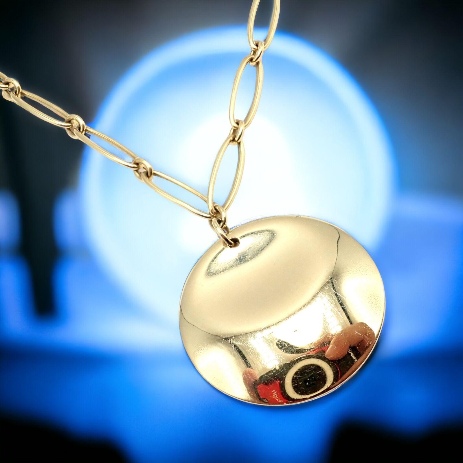 18k Yellow Gold 30mm Round Disc Pendant Necklace by Elsa Peretti for Tiffany & Co. 
This authentic necklace is a refined creation from Tiffany & Co., designed by Elsa Peretti. It features a 30mm disc pendant, showcasing Peretti's celebrated