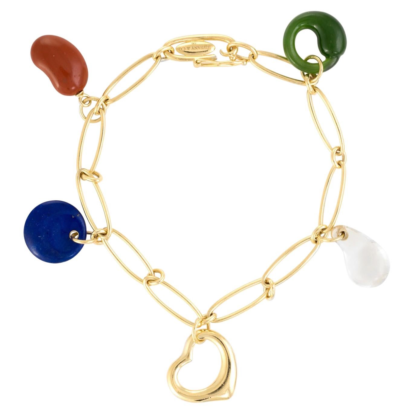 Tiffany & Co. Elsa Peretti 5 Charm Bracelet 18 Karat Gold Estate Fine Jewelry