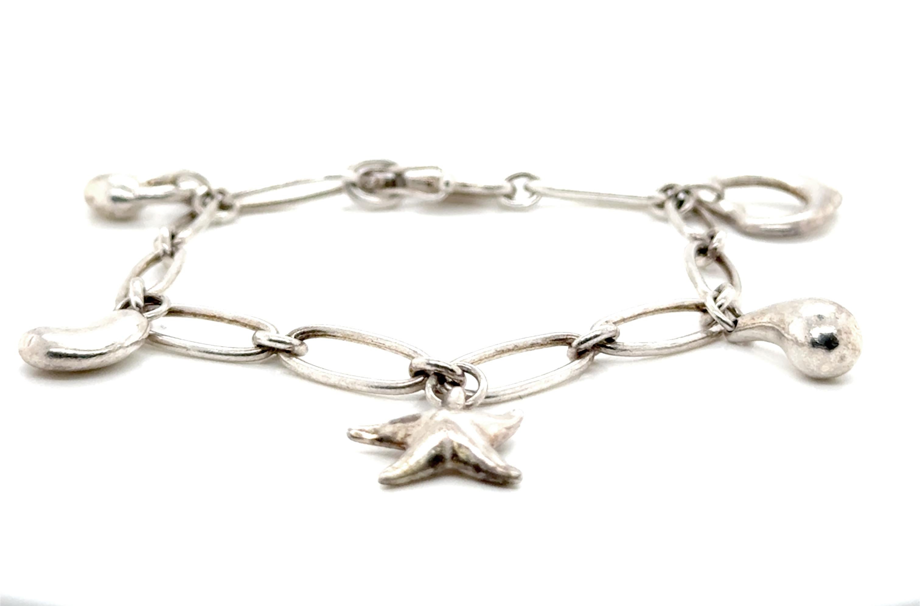 Tiffany & Co. Elsa Peretti 5 Icon Element Charm Bracelet Sterling Silver Rare


100% Genuine Tiffany & Co. Sterling Silver 5 Icon Element Charm Bracelet

The Bracelet Suspends Five Charms Including the Bean, Eternal Circle, Starfish, Teardrop and