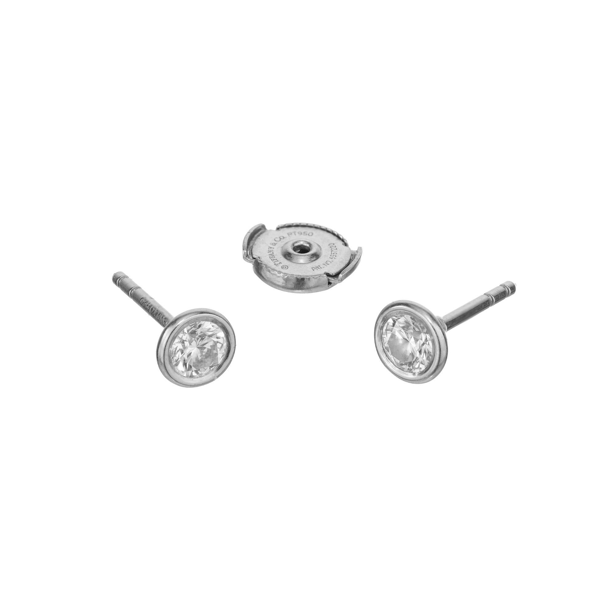 Elsa Peretti Tiffany & Co. .66ct Diamond by the Yard bezel set stud earrings. These simple sleek classic earrings are set in platinum with the original platinum safety backs insuring maximum protection and security when worn. These earrings are in