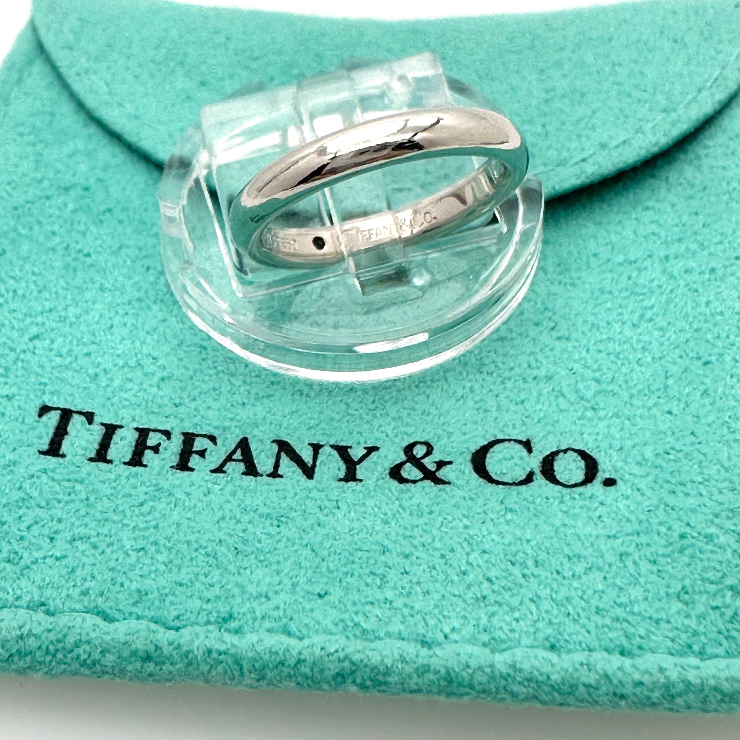 Tiffany & Co. Elsa Peretti Band Ring
Style:  Band
Ref. number:  60016398
Metal:   Platinum PT950
Size:  4.25 sizable
Measurements:  2.9 MM Width & 1.9 MM Height
Main Diamond:  Round Brilliant Diamond 0.02 cts
Color & Clarity:  White &