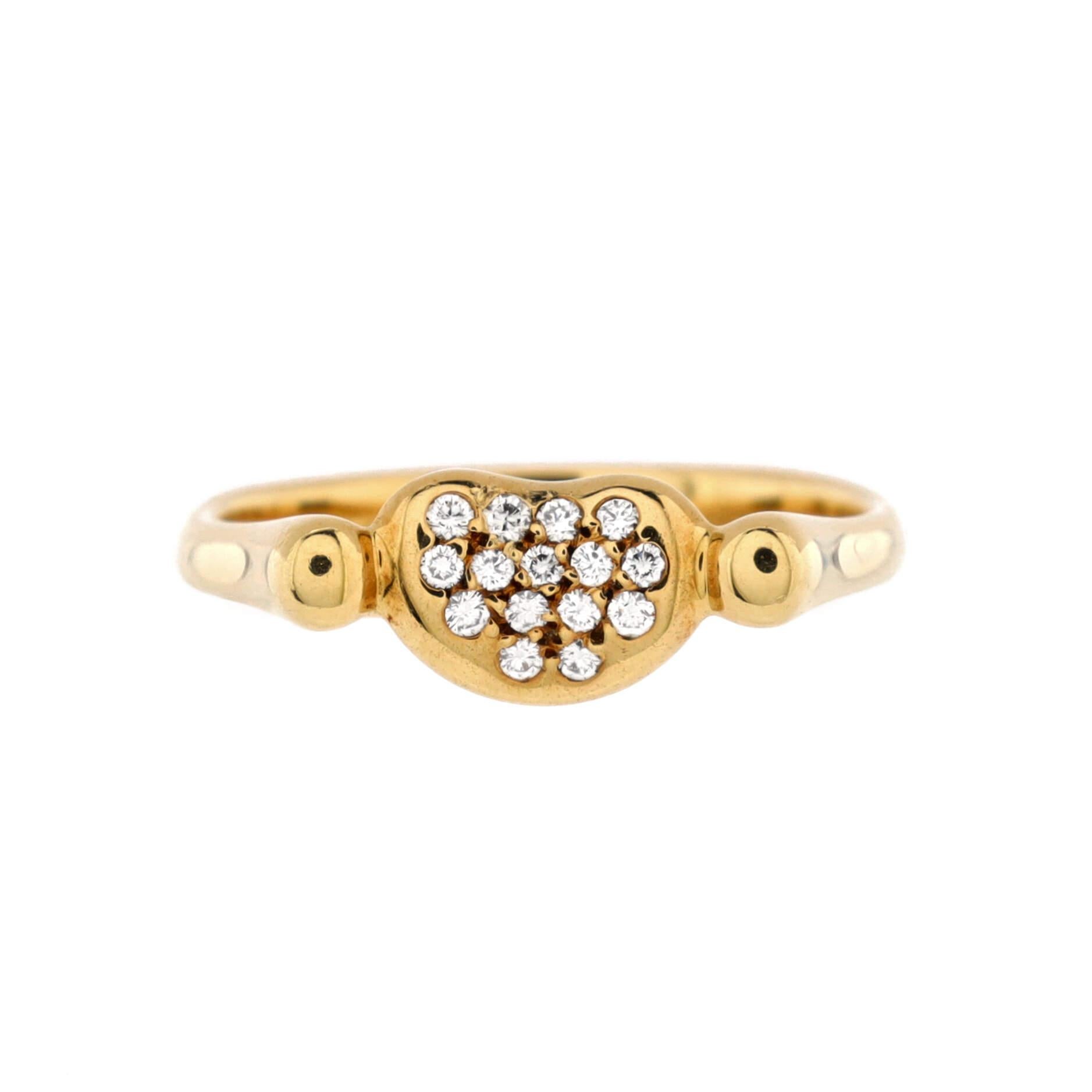 Condition: Very good. Moderate wear throughout.
Accessories: No Accessories
Measurements: Size: 6.25 - 53, Width: 3.20 mm
Designer: Tiffany & Co.
Model: Elsa Peretti Bean Band Ring 18K Yellow Gold with Diamonds
Exterior Color: Yellow Gold
Item