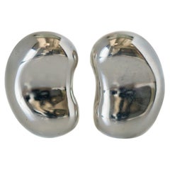 Tiffany and Co. Elsa Peretti Bean Collection Sterling Silver Ear Clips at  1stDibs | elsa peretti ear clips, bean design ear clips, elsa clip on  earrings