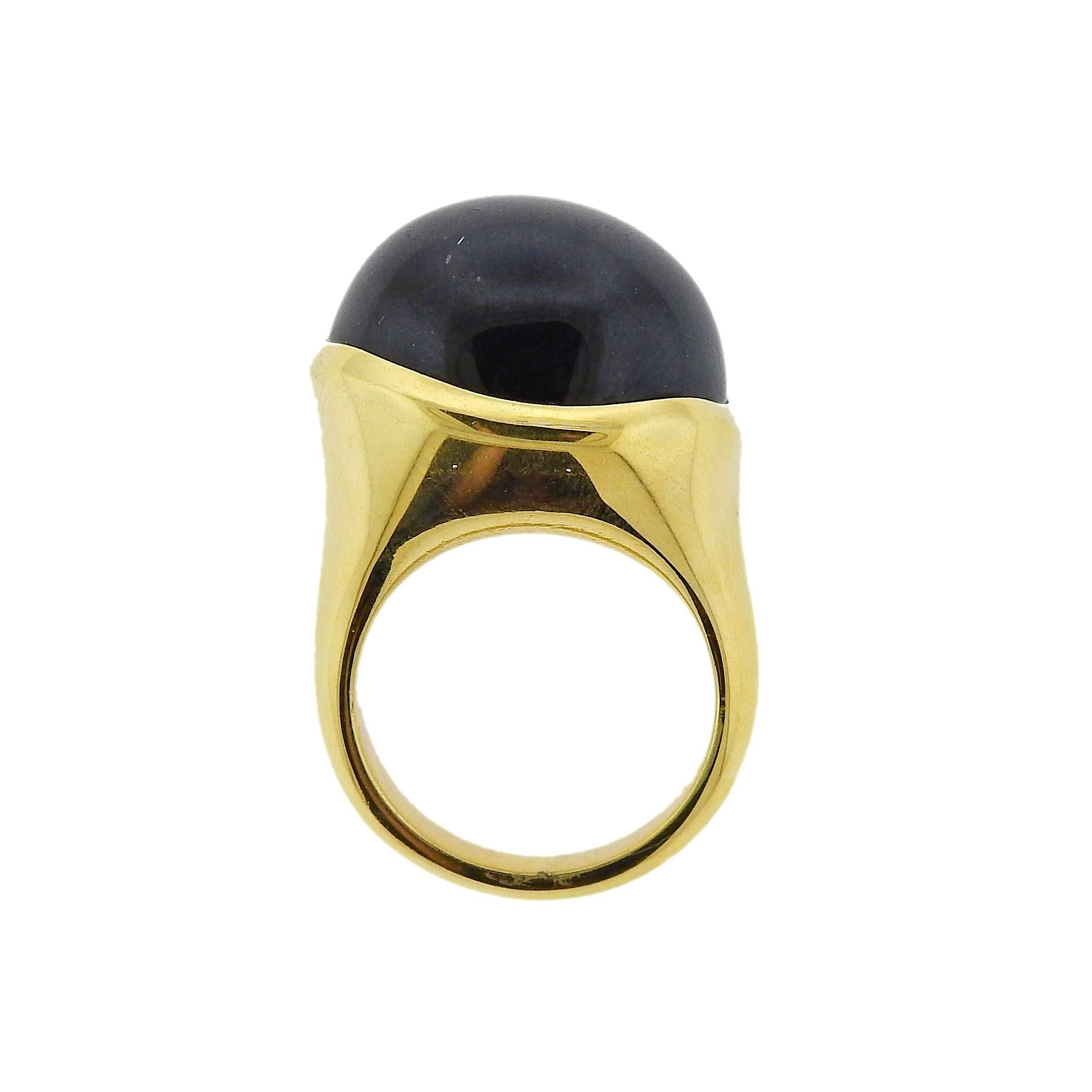 18k yellow gold ring by Elsa Peretti, designed for Tiffany & Co, set with black jade cabochon (16.7mm x 19.8mm). Ring size - 7, ring top - 18mm x 22mm. Weighs 18.6 grams. Marked: Tiffany & Co, Elsa Peretti, 750, Hong Kong.  