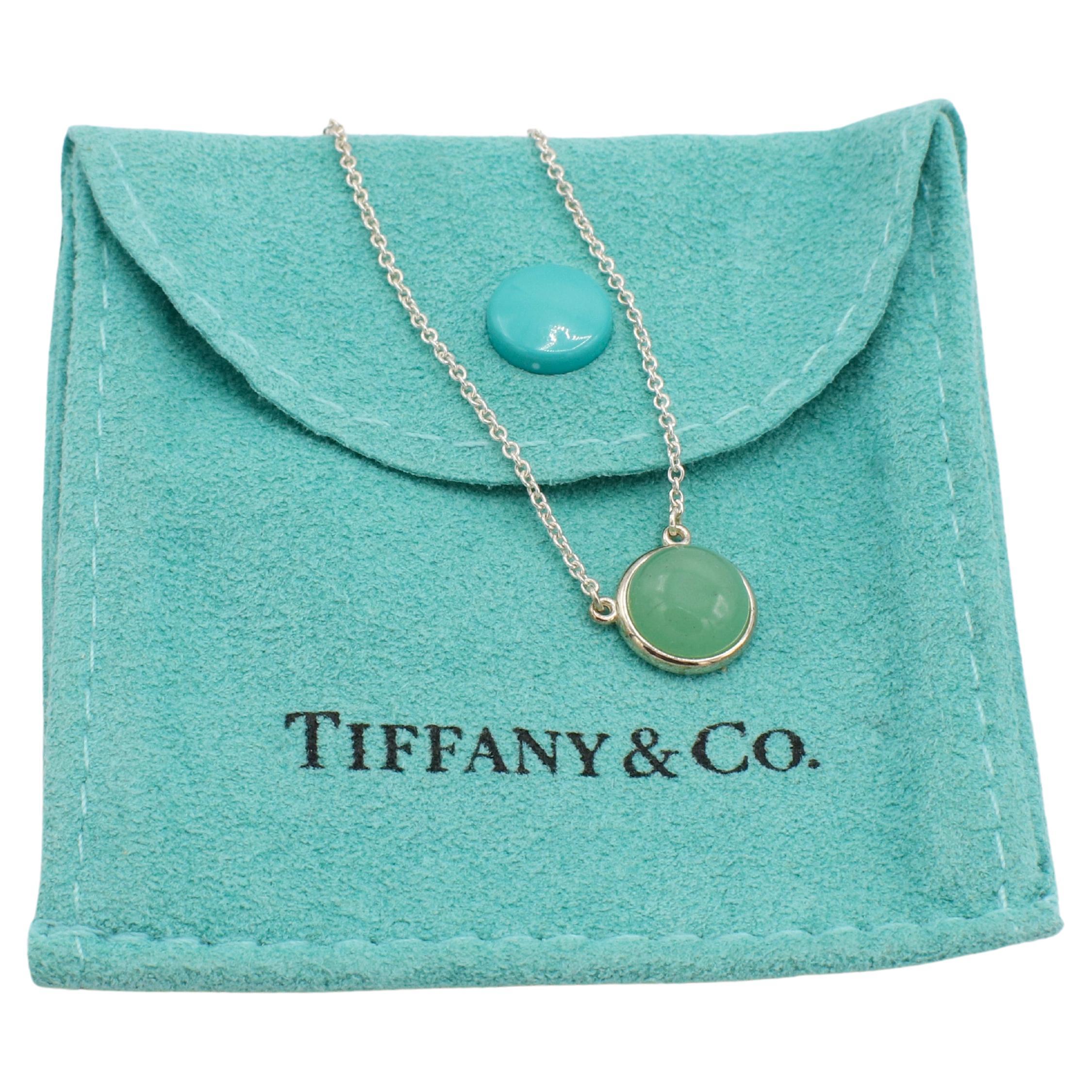 Tiffany & Co. Elsa Peretti Color By the Yard Aventurine Sterling Silver Necklace
Metal: Sterling silver 925
Weight: 2.32 grams
Gemstone: Aventurine Quartz cabochon, 8.5mm
Chain: 18 inches
Signed: Tiffany & Co. ©Peretti Spain Ag925

