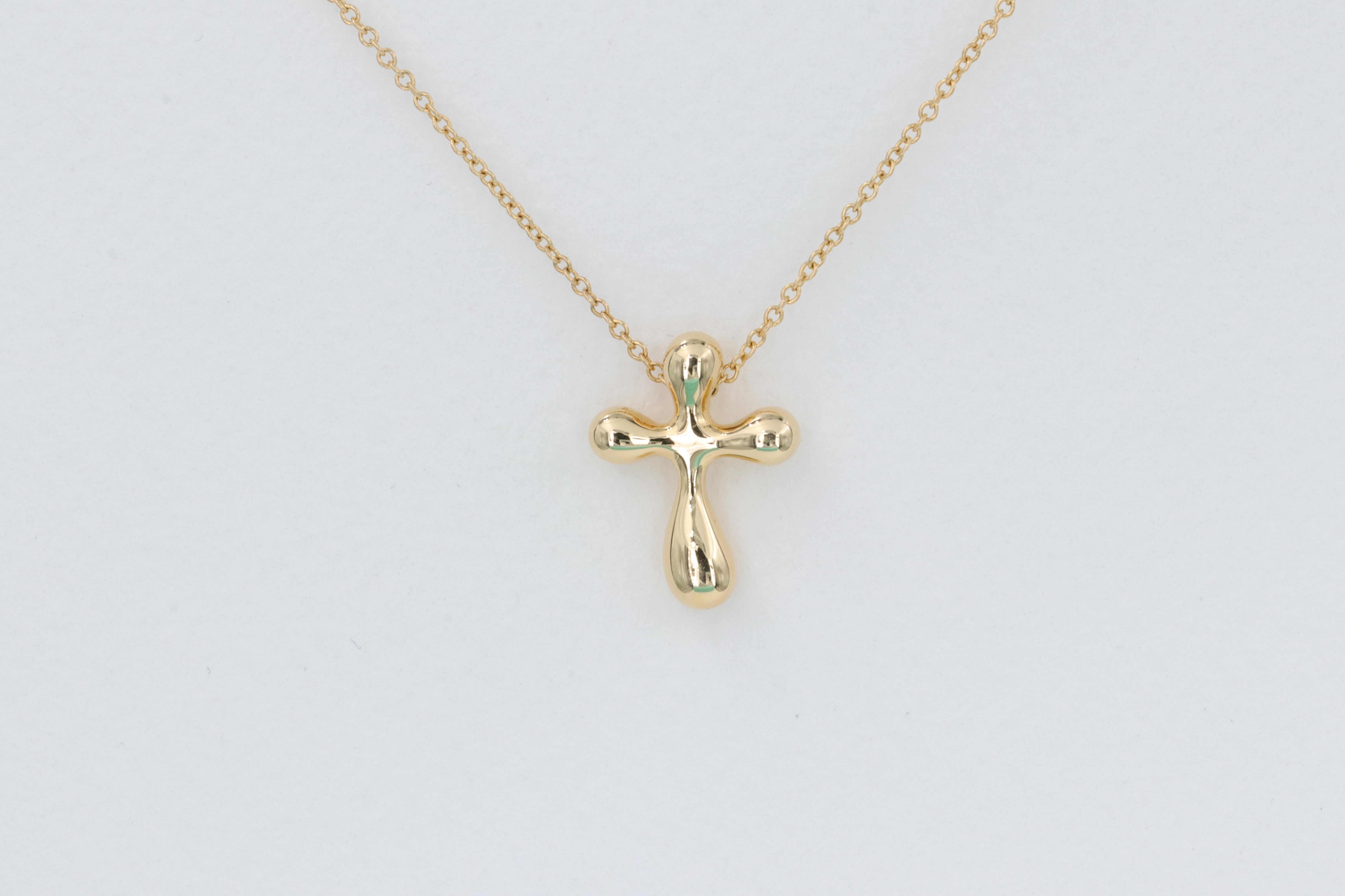 Tiffany & Co. Elsa Peretti Cross Pendant 18 Karat Yellow Gold 

Necklace - 16 in 
Cross - 12mm Width 
Weight - 4.0 Grams 