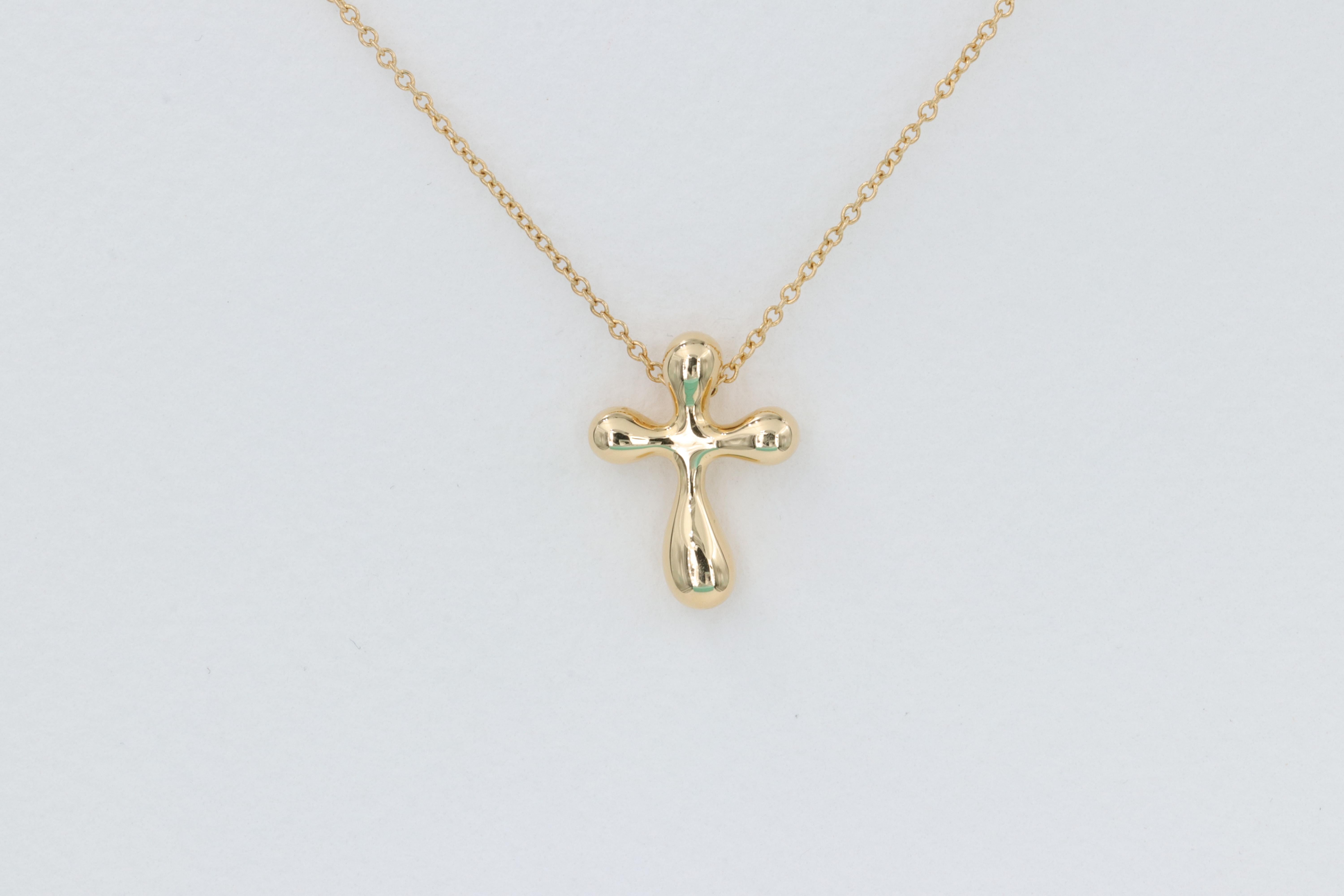 Tiffany & Co. Elsa Peretti Kreuz-Anhänger 18 Karat Gelbgold 

Halskette - 16 in 
Kreuz - 12mm Breite 
Gewicht - 4,0 Gramm 