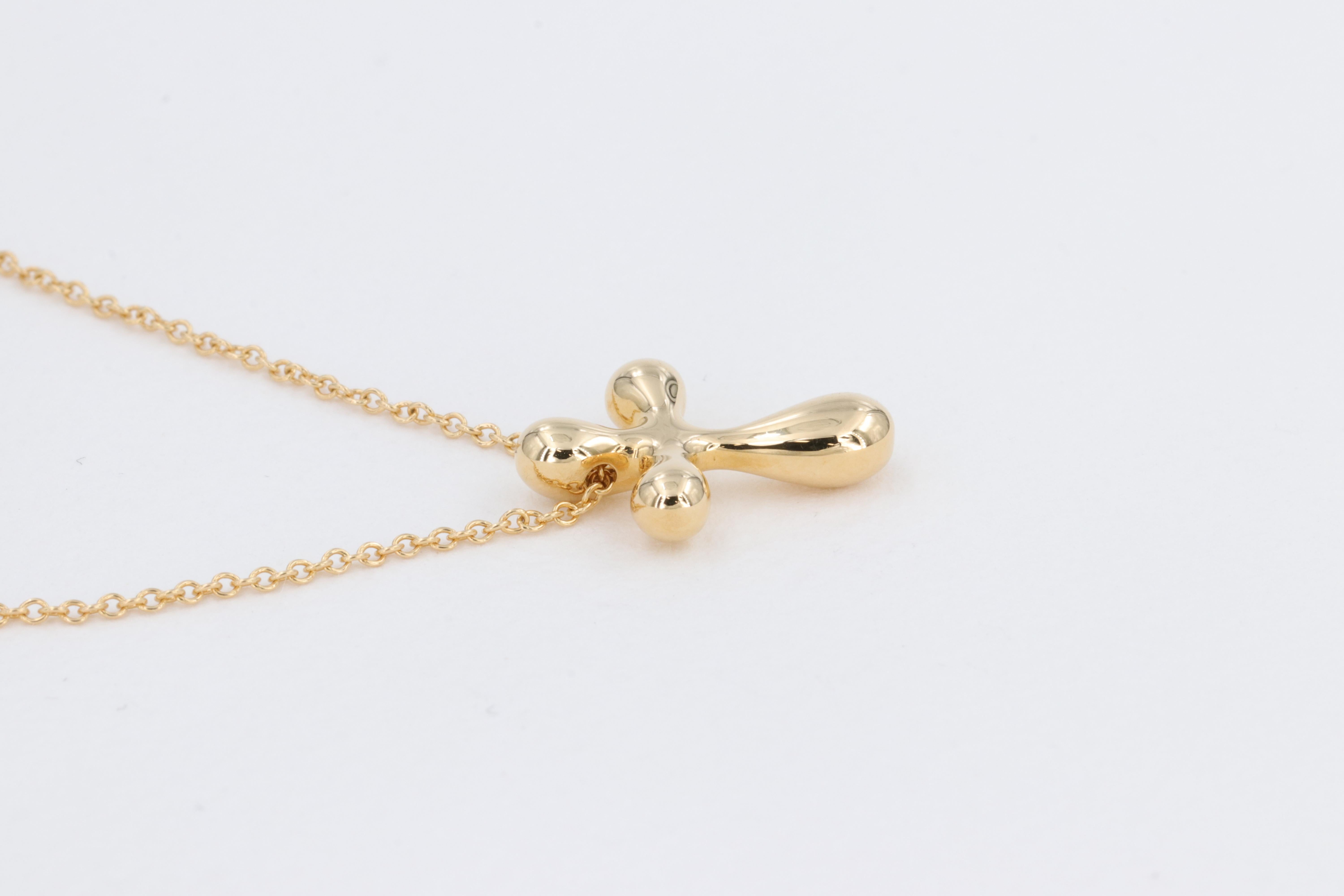 Tiffany & Co. Elsa Peretti Kreuzanhnger aus 18 Karat Gelbgold für Damen oder Herren