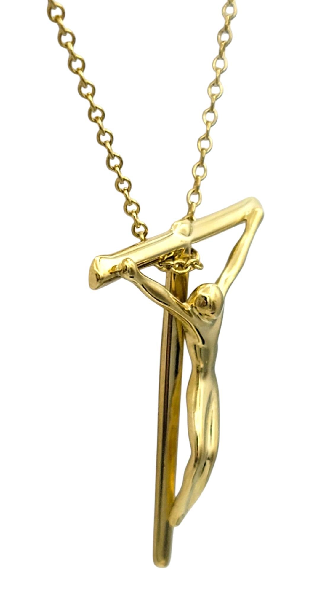 Contemporary Tiffany & Co. Elsa Peretti Crucifix Pendant Necklace in 18 Karat Yellow Gold For Sale