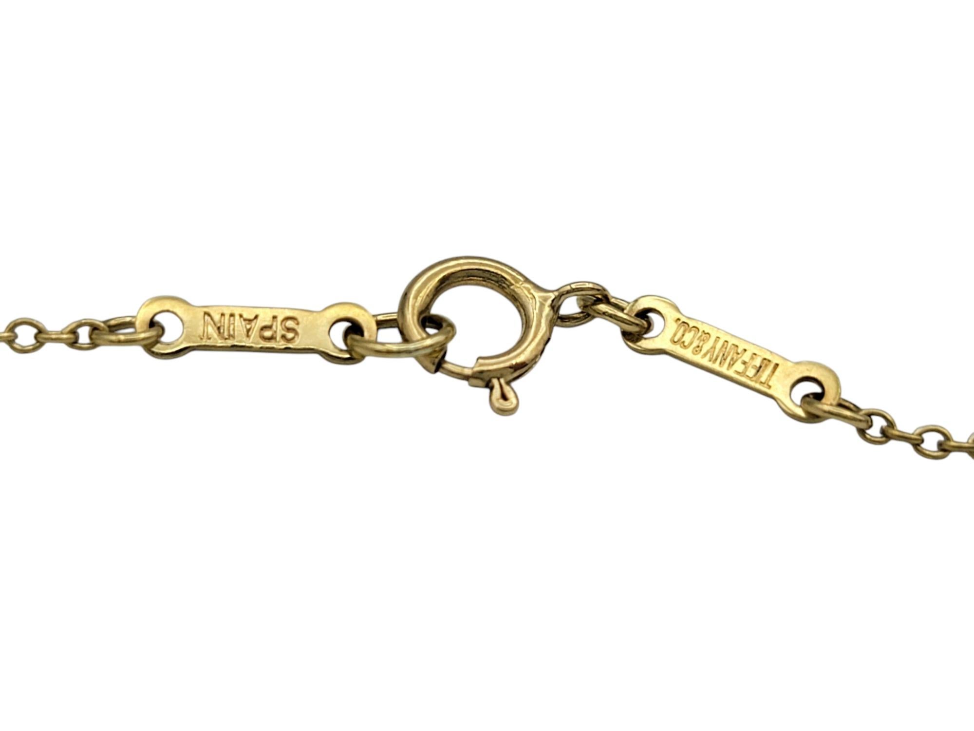Tiffany & Co. Elsa Peretti Crucifix Pendant Necklace in 18 Karat Yellow Gold For Sale 1