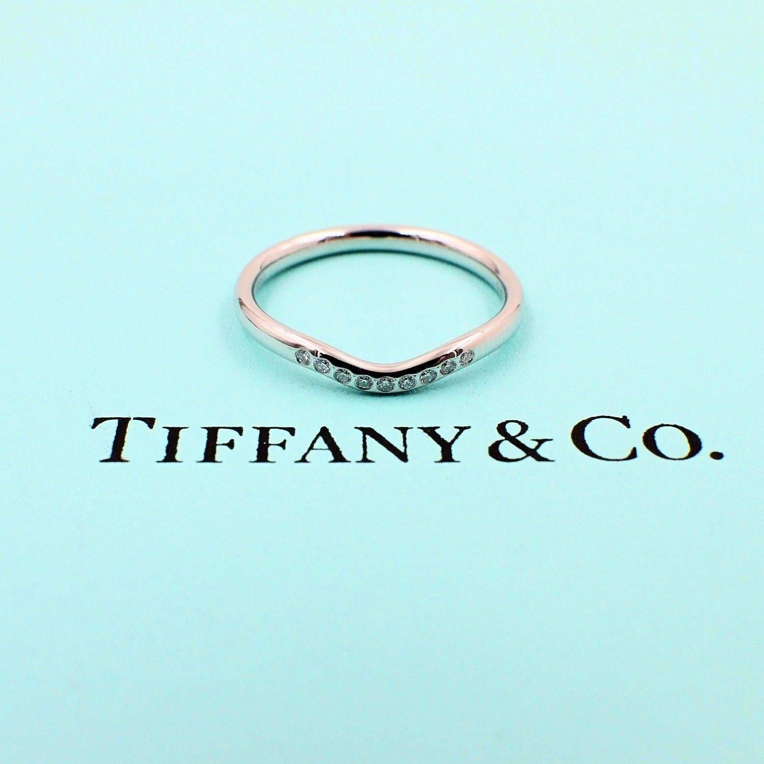 Tiffany & Co.
Style:  Elsa Peretti Wedding Band Ring
Serial Number:  15636939
Metal:  PT950 Platinum
Size:  8.25 - sizable
Total Carat Weight:  0.06 TCW
Diamond Shape:  Round Brilliant Diamonds
Diamond Color & Clarity:  F / VVS
Hallmark: 