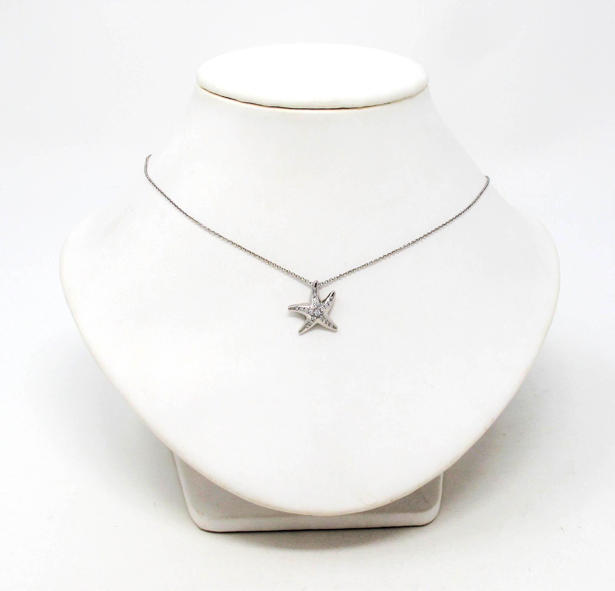 Calling all ocean lovers! This charming and delicate diamond starfish pendant necklace designed by Elsa Peretti for Tiffany & Co. will remind you of a dazzling day out at the sea. The modernized starfish motif is embellished with glittering Tiffany