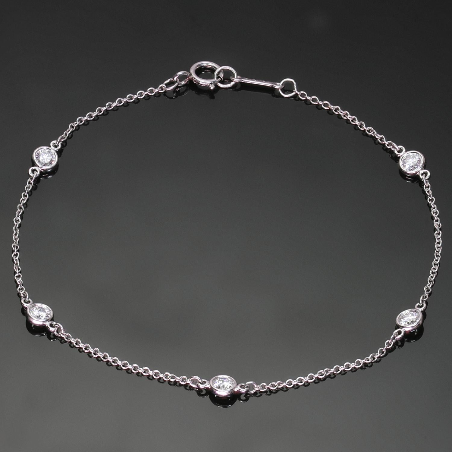 This exquisite Tiffany & Co. Diamond by the Yard bracelet is crafted in platinum and features 5 diamonds in 3.7mm round bezel settings. The round brilliant G VVS2-VS1 diamonds weigh an estimated 0.40 carats. Made in United States circa 2010s.