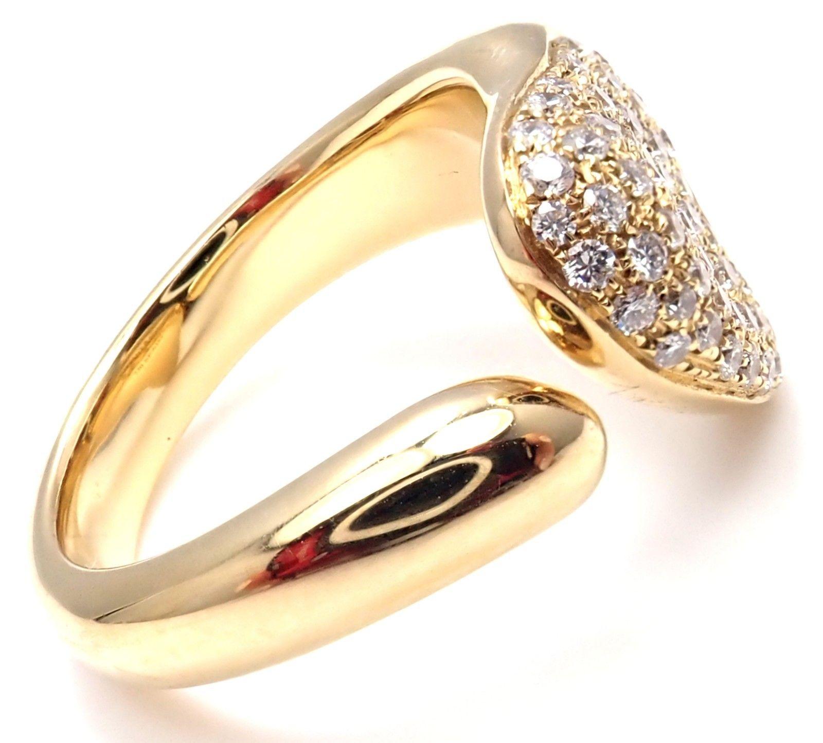 18k Yellow Gold Diamond Heart Band Ring designed by Elsa Peretti for Tiffany & Co. 
With 48 Round Brilliant Cut Diamonds VS1 clarity, G color, Total weight Approx .50ct
Details:
Ring Size: 6.5, Resize is Available
Weight: 9.2 grams
Width: 