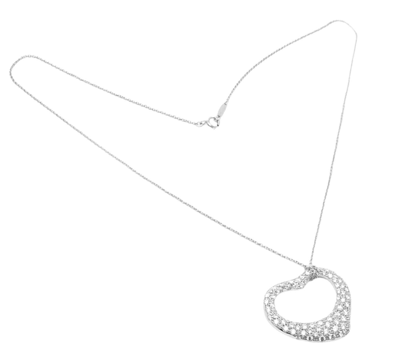Platinum Diamond Large Open Heart Pendant Necklace by Elsa Peretti for Tiffany & Co.
With Diamonds VS1 clarity, G color total weight approx. 3.00ct
Retail Price: $24,000 plus tax.
Details:
Length: 17