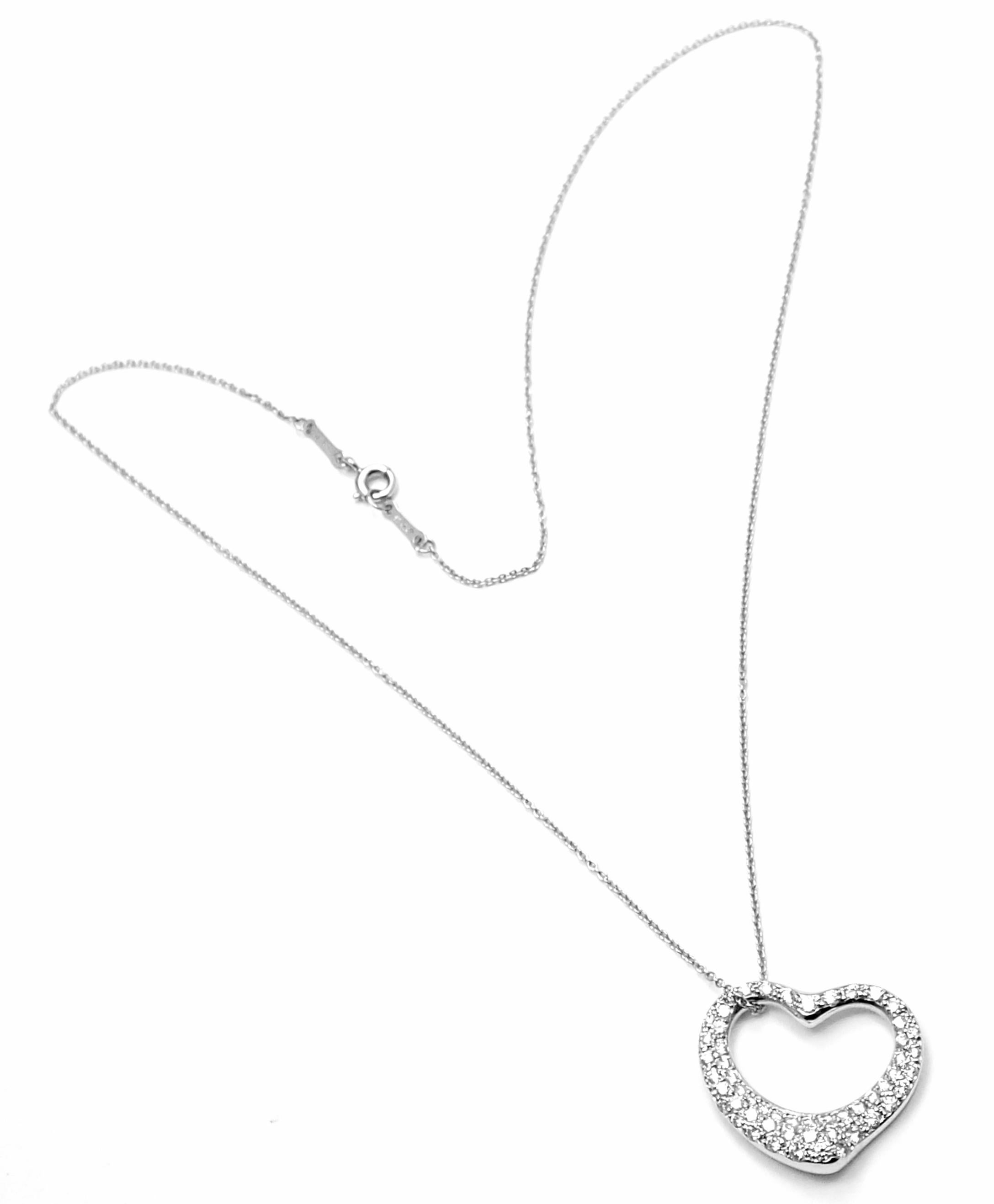 Platinum Diamond Medium Open Heart Pendant Necklace by Elsa Peretti for Tiffany & Co.
With Round brilliant cut diamonds VS1 clarity, G color
Details:
Length: 16