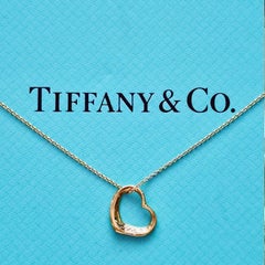 Tiffany & Co. Collier à cœur ouvert en or jaune 18 carats et diamants Elsa Peretti