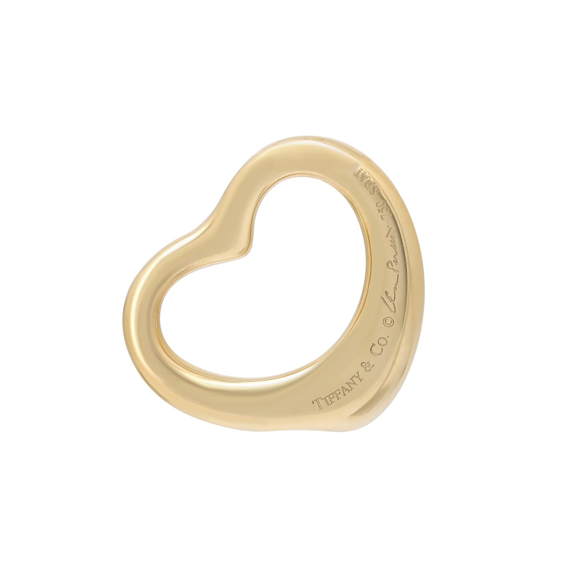 Tiffany & Co. Elsa Peretti open heart diamond pendant. This design celebrates the spirit of love. Shimmering diamonds accentuate the elegant curves of this pendant. Crafted in 18k yellow gold with pave set round brilliant cut diamonds weighing