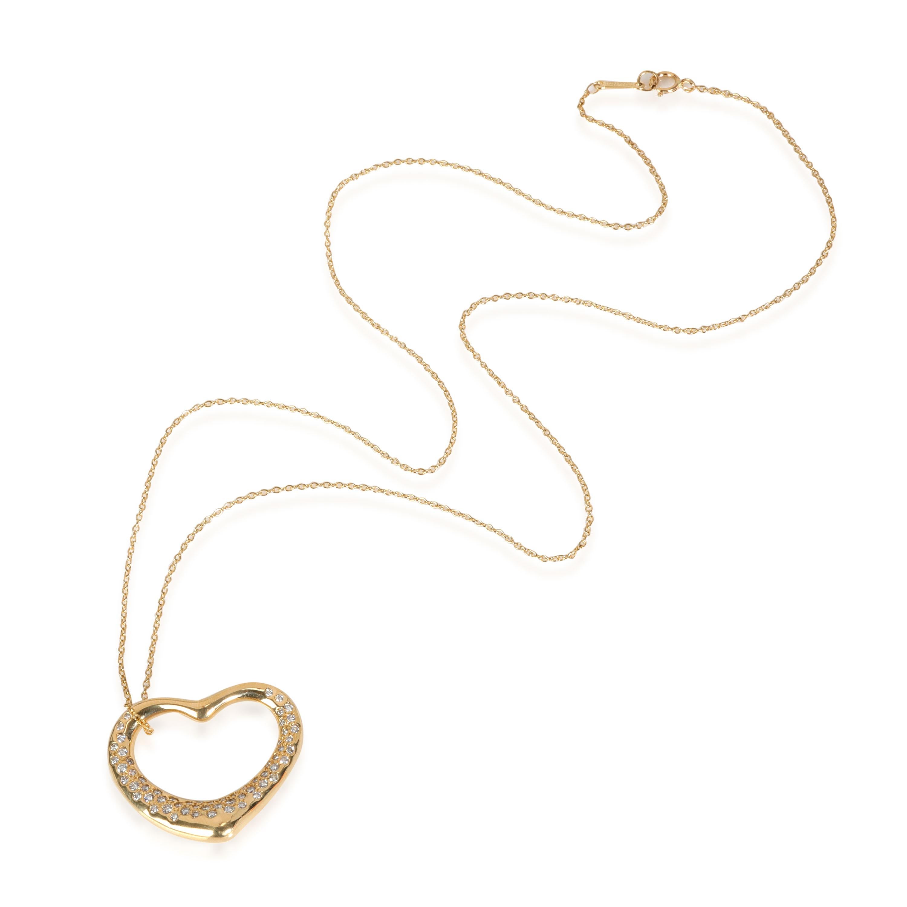 Tiffany & Co. Elsa Peretti Diamond Open Heart Pendant in 18k Yellow Gold 1 CTW

PRIMARY DETAILS
SKU: 116732
Listing Title: Tiffany & Co. Elsa Peretti Diamond Open Heart Pendant in 18k Yellow Gold 1 CTW
Condition Description: Retails for 9200 USD. In