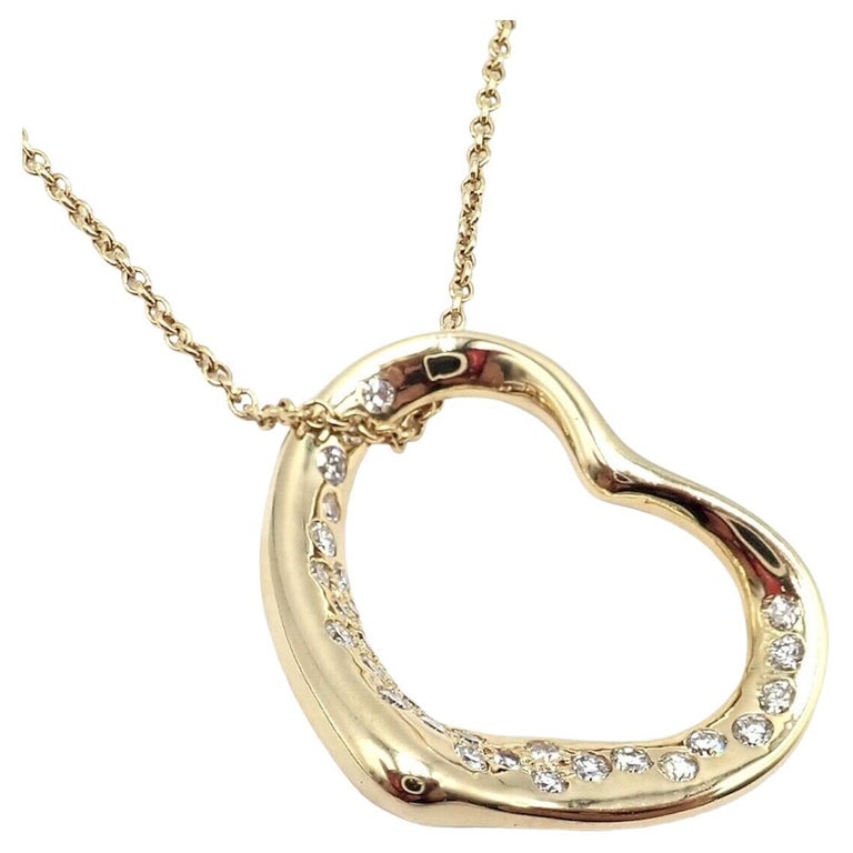 Tiffany and Co. Collier pendentif Elsa Peretti en or jaune à cœur ouvert et  diamants En vente sur 1stDibs