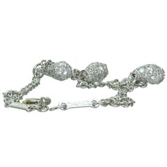 Tiffany & Co. Bracelet à breloques en diamant et platine Elsa Peretti