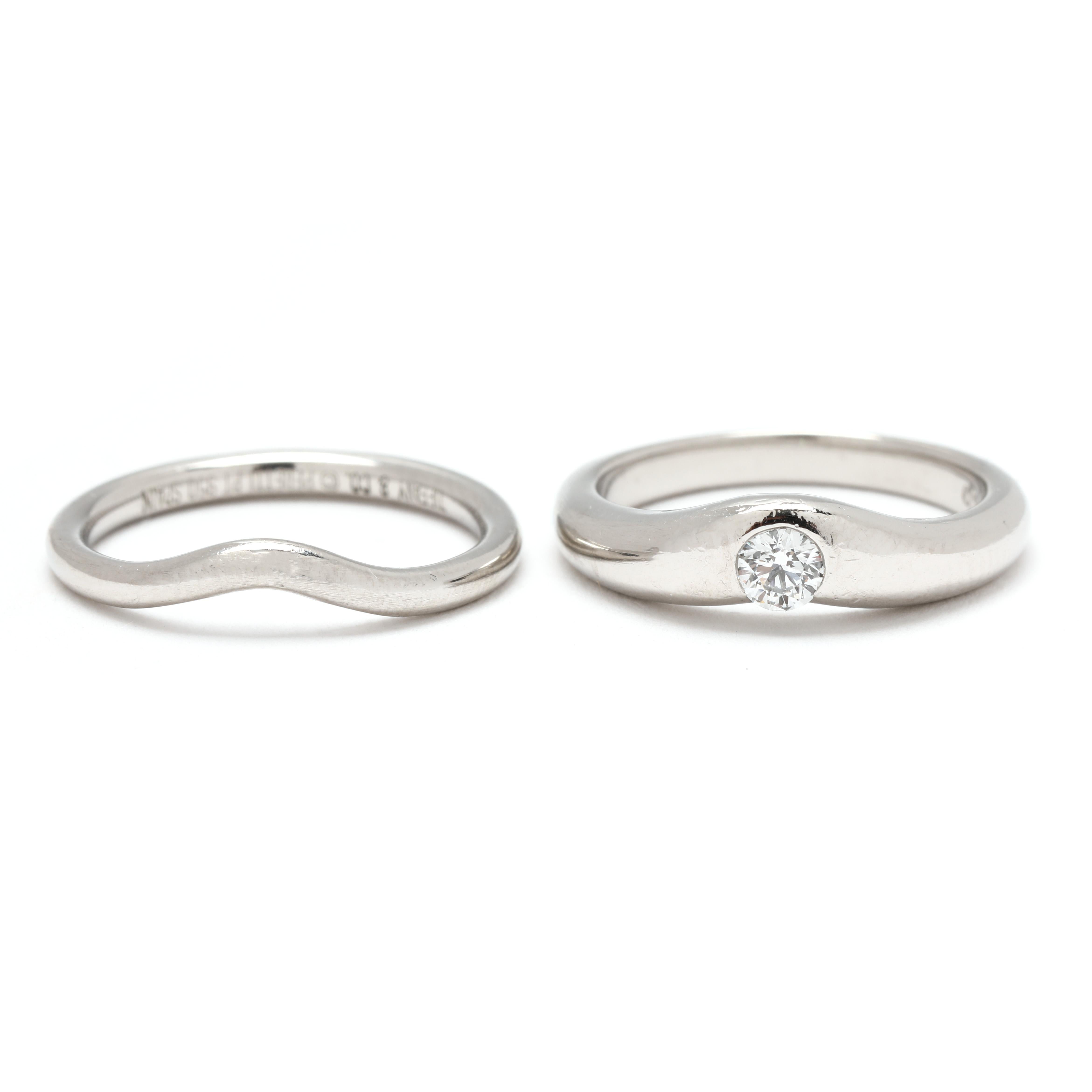 Piedras:
diamante
talla brillante redonda
3.5 mm
aproximadamente 0,18 quilates en total
Color EF/ Claridad VS2

Anillo talla 5

Altura del dedo: 3.3 mm

Anchura Juntos: 6,7 mm

Peso: 6,4 dwts. / 10 gramos

Sellos: Peretti Tiffany & Co PT 950

Un par