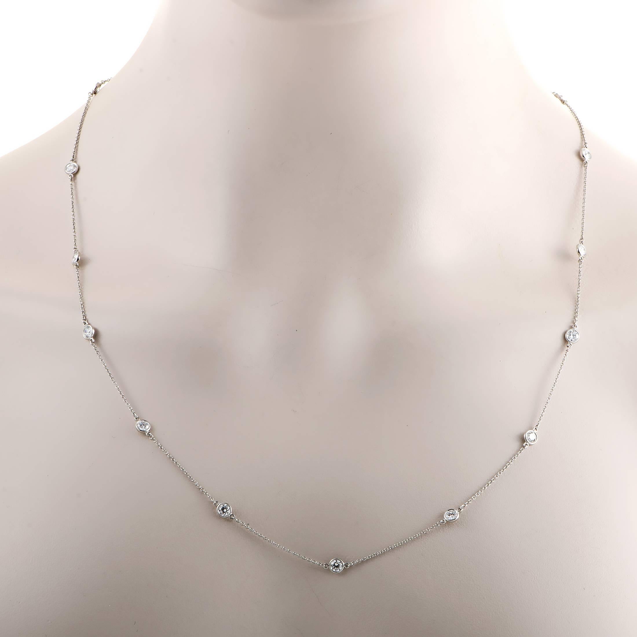 Prestigious resplendence, aesthetic refinement and tender femininity are clearly stated in this sublime necklace designed by Elsa Peretti for Tiffany & Co. which combines charming diamonds totaling 2.80 carats with fascinatingly supple and elongated