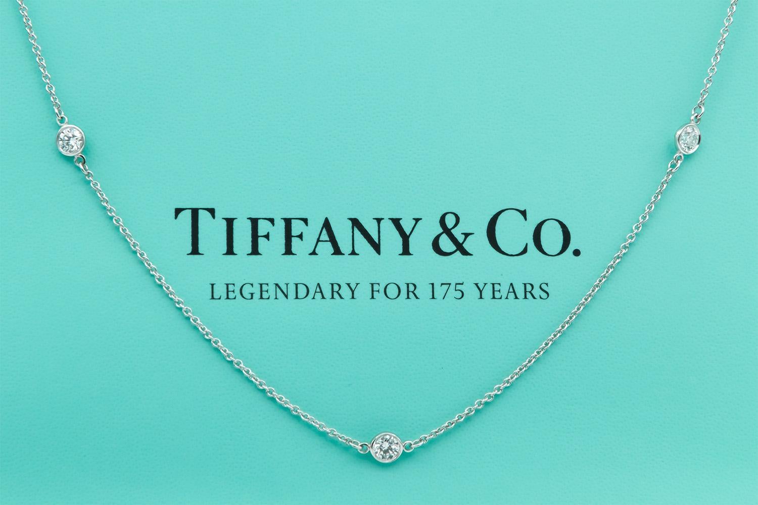 We are pleased to offer this Authentic Tiffany & Co. Elsa Peretti Diamonds By The Yard Platinum Necklace. Elsa Peretti, a true pioneer of design, translates all she sees in the natural world into jewelry that is sculptural, organic and irresistibly