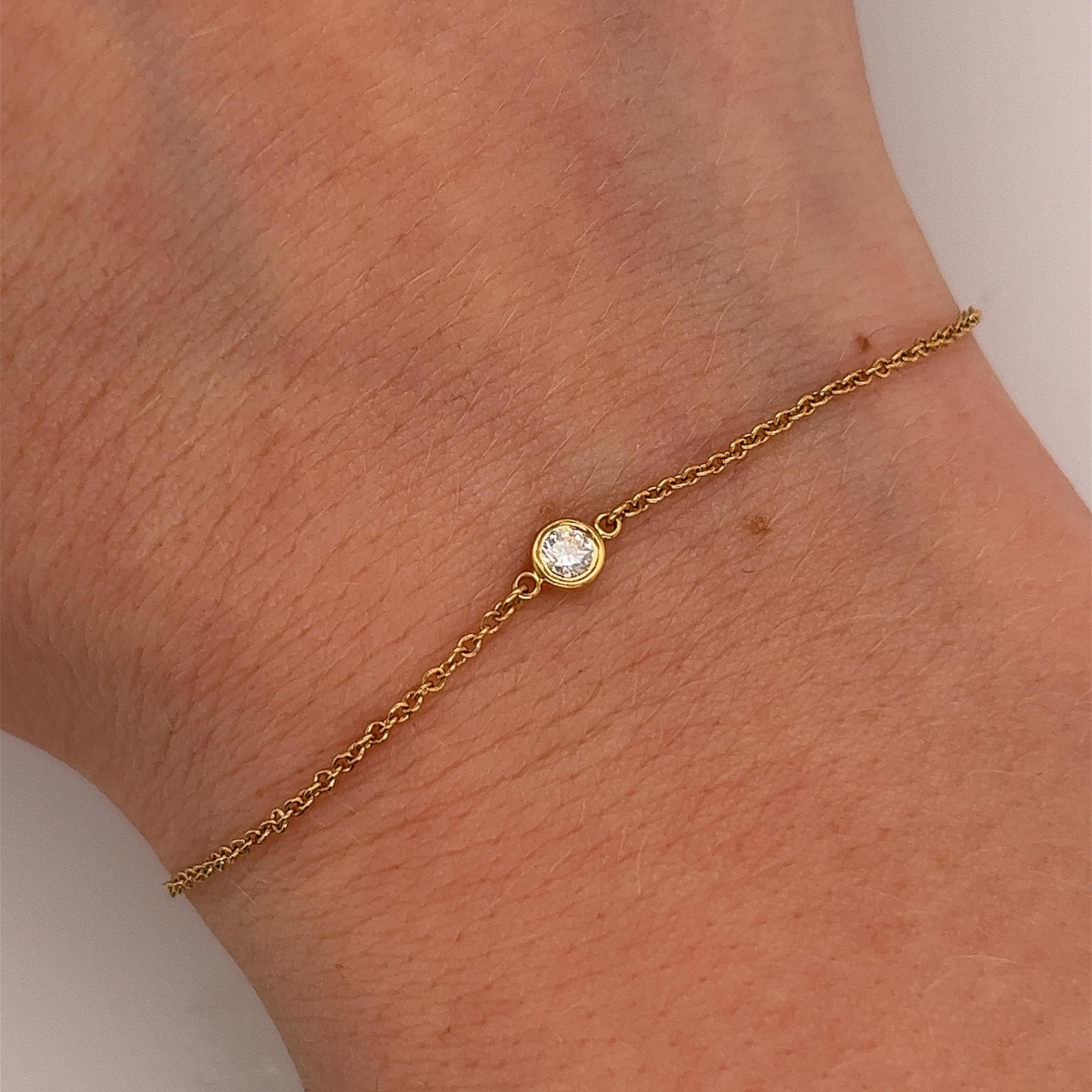 Tiffany &Co Elsa Peretti Diamanten von Tiffany &Co by the yard Ein einzelner Diamant in 18 Karat Gelbgold im Zustand „Hervorragend“ in London, GB