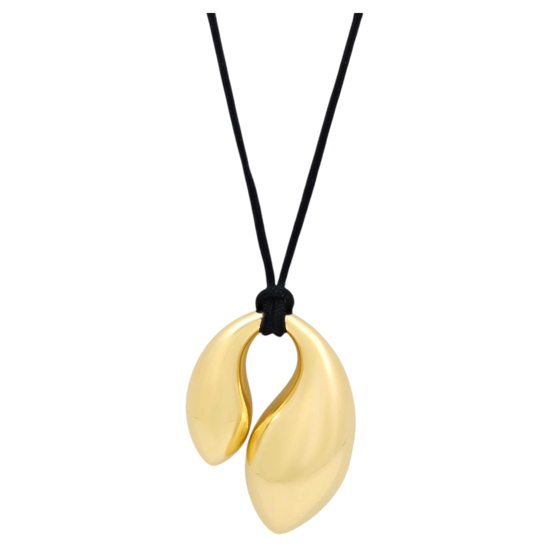 Tiffany & Co. Colgante «Double Teardrop» de Elsa Peretti en oro de 18 quilates. (Seminuevo)