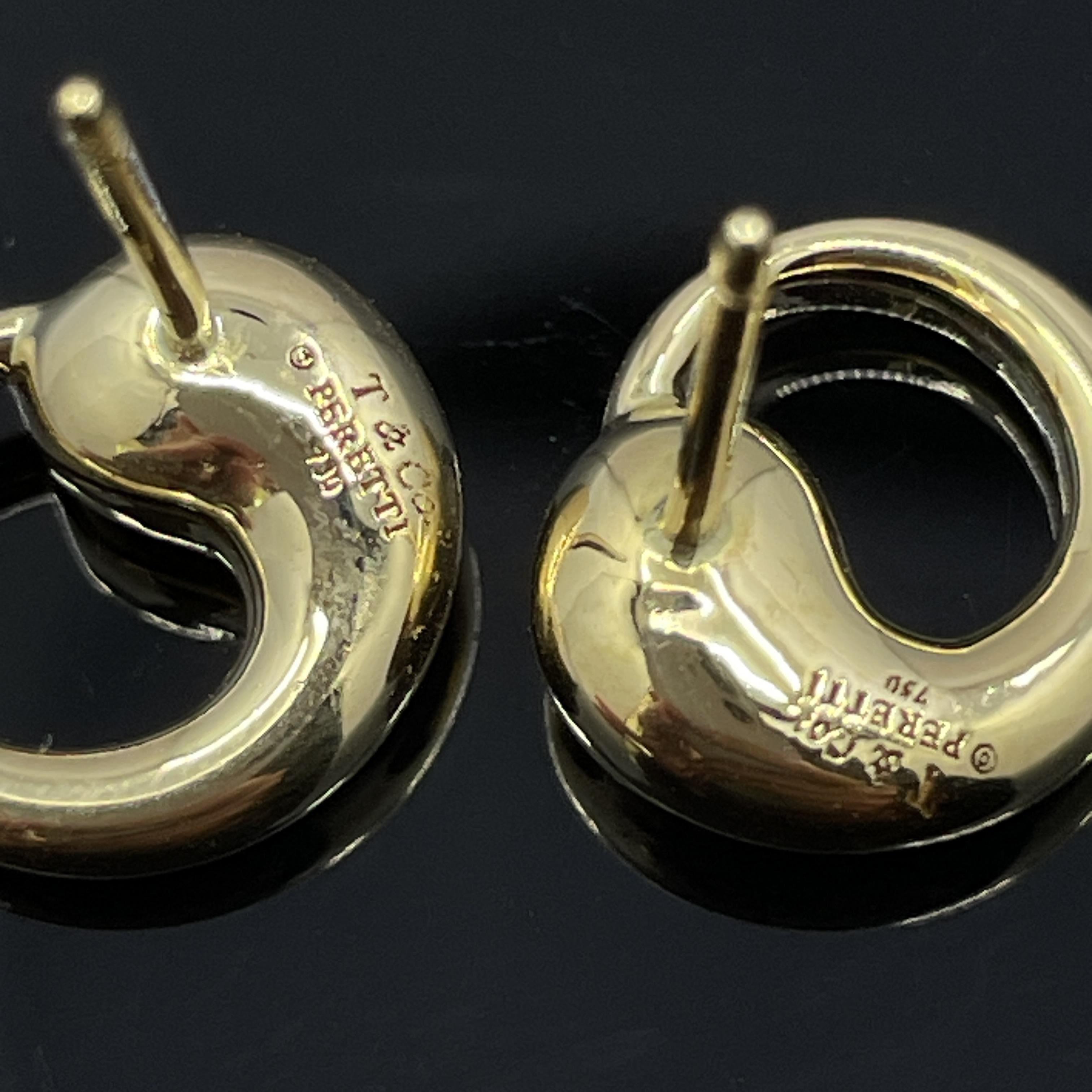 Tiffany & Co. Orecchini a cerchio eterno Elsa Peretti - Oro giallo 18 carati, 6,1 g

Disegnate da Elsa Peretti for Tiffany & Co. le borchie Eternal Circle sono un'espressione senza tempo di fluida semplicità ed eleganza scultorea.

Autentico Tiffany