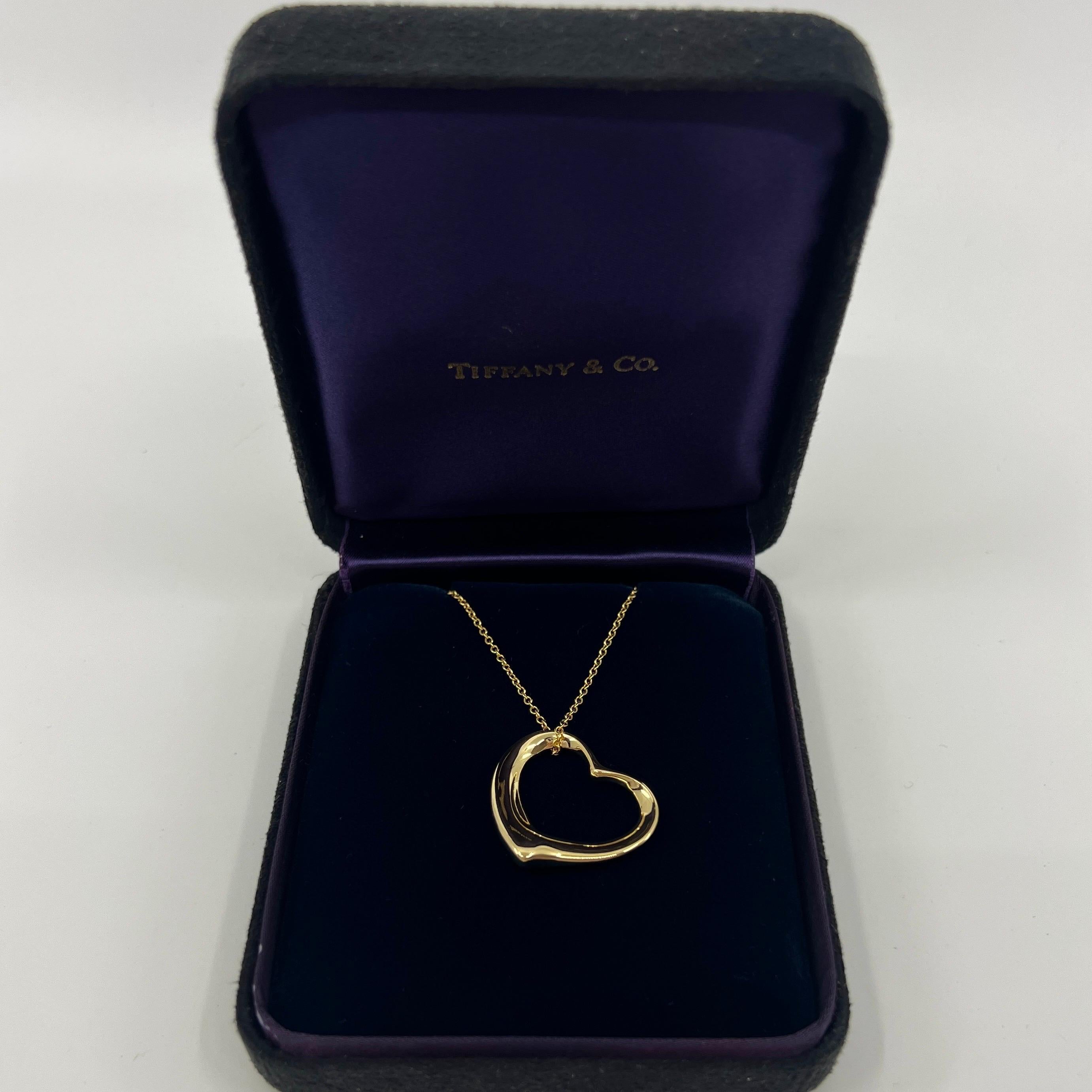 Vintage Tiffany & Co. Elsa Peretti Large Open Heart 18k Yellow Gold Pendant Necklace.

A beautiful and rare authentic Tiffany & Co extra large open heart pendant from the stylish and popular Elsa Peretti range. Extra large size pendant.

A rare