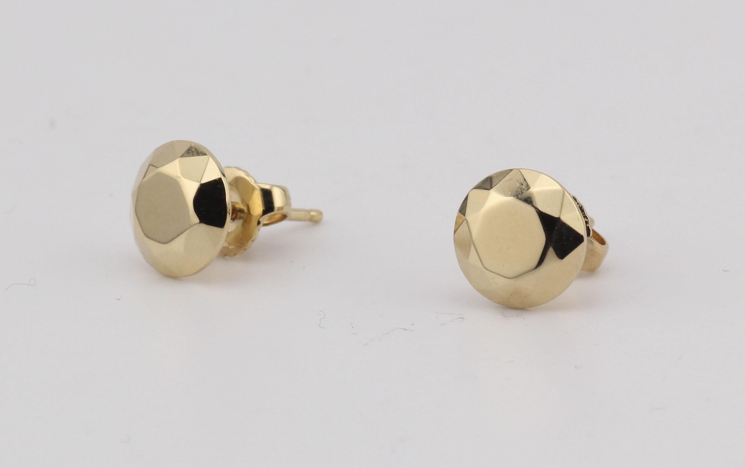 Discover the refined elegance of these 18K Yellow Gold Stud Earrings, a testament to minimalist design and timeless sophistication. Crafted with precision, these earrings embody a subtle yet striking allure.

The earrings feature a classic round