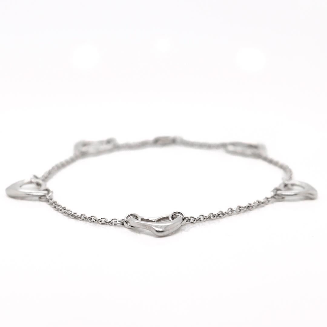 Modern Tiffany & Co Elsa Peretti Five Open Hearts Sterling Silver Bracelet For Sale