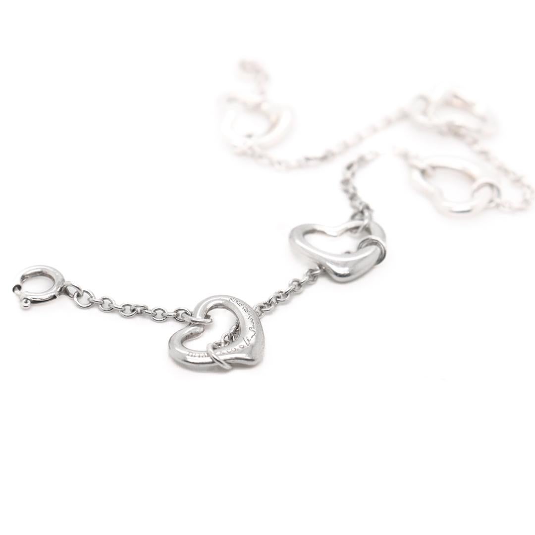 Tiffany & Co Elsa Peretti Five Open Hearts Sterling Silver Bracelet In Good Condition For Sale In Philadelphia, PA