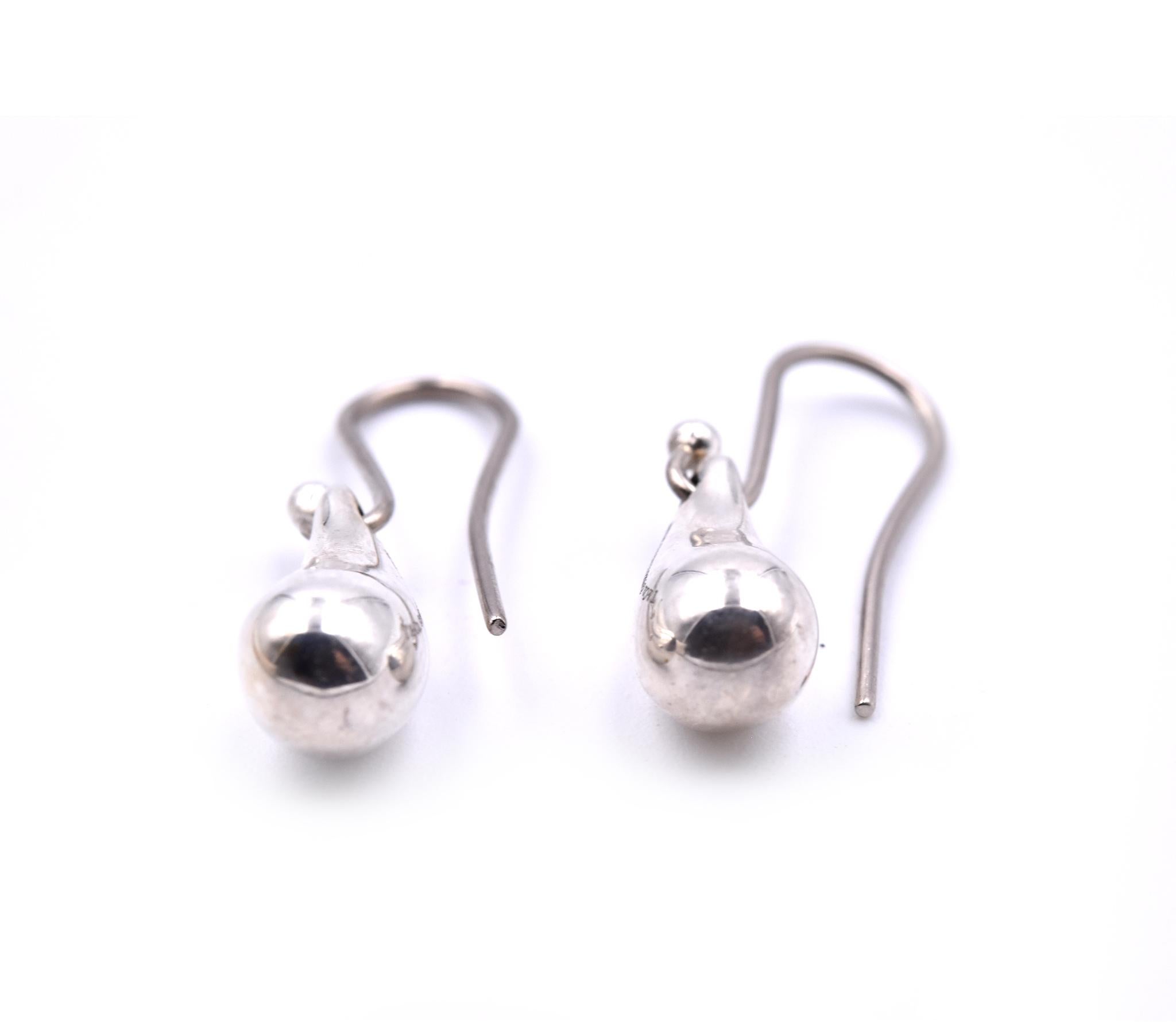 Designer: Elsa Peretti, Tiffany & Co.
Material: sterling silver
Fastenings: shepherd’s hook 
Dimensions: earrings are 22.20mm by 5.87mm
Weight: 3.97 grams