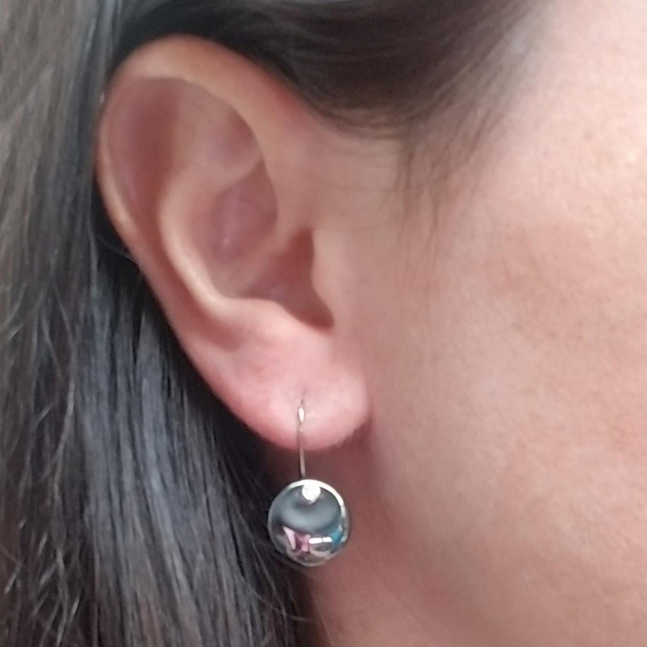 Tiffany & Co Sterling Silver Drop Earrings From The Full Moon Collection. The Earrings Feature Two Round Carved Dark Gray, Metallic Hematite Stones and 2 Round Diamonds. Shepherd's Hook Attachment. $700 MSRP.