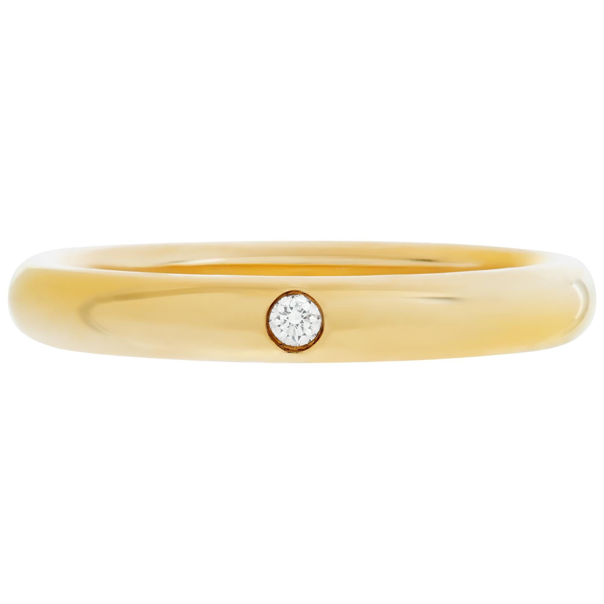 Tiffany & Co. Elsa Peretti band ring in 18k yellow gold with 0.02 carat single diamond. 2.8mm width. Size 6.This Tiffany & Co. ring is currently size 6 and some items can be sized up or down, please ask! It weighs 5.6 pennyweights and is 18k.