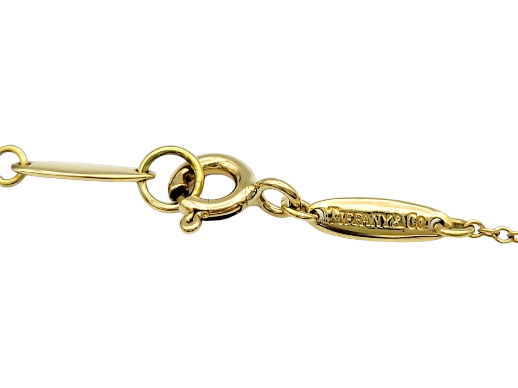 Contemporary Tiffany & Co. Elsa Peretti Infinity Cross Pendant Necklace, 18 Karat Yellow Gold