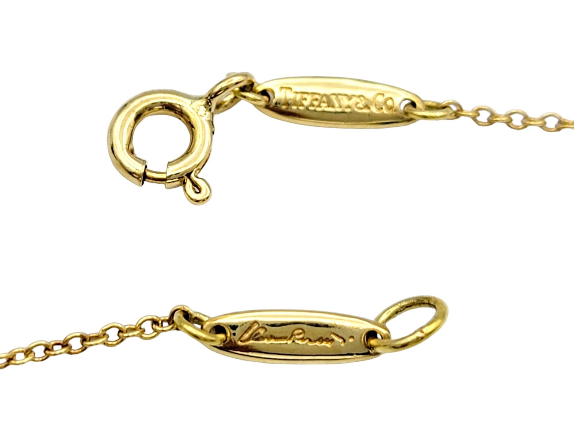 Tiffany & Co. Elsa Peretti Infinity Cross Pendant Necklace, 18 Karat Yellow Gold In Excellent Condition In Scottsdale, AZ