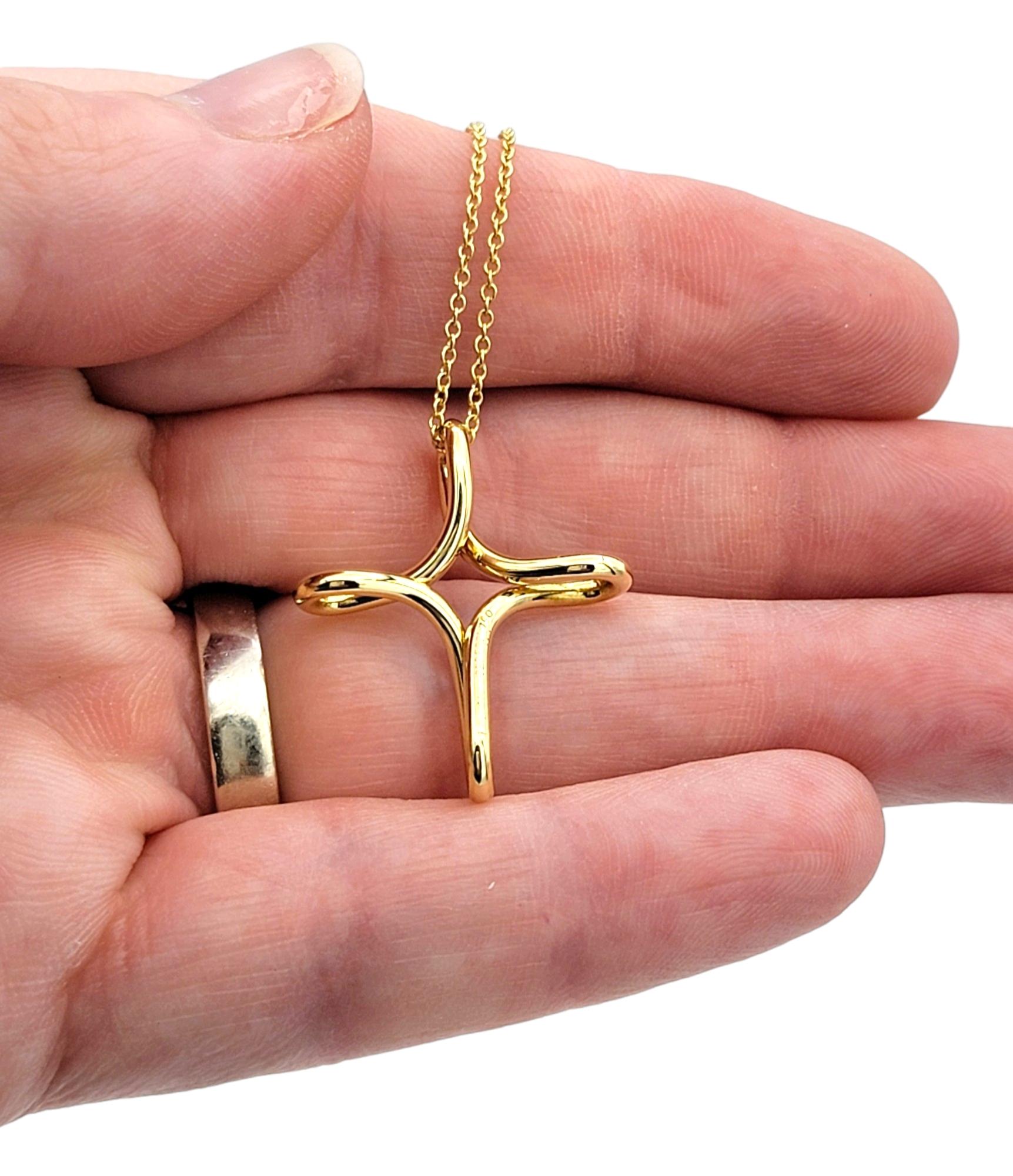 Tiffany & Co. Elsa Peretti Infinity Cross Pendant Necklace, 18 Karat Yellow Gold 1