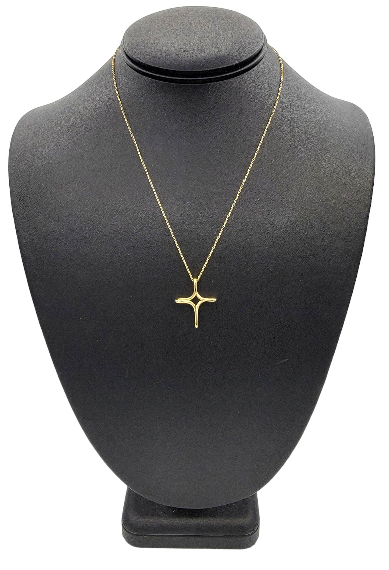 Tiffany & Co. Elsa Peretti Infinity Cross Pendant Necklace, 18 Karat Yellow Gold 2