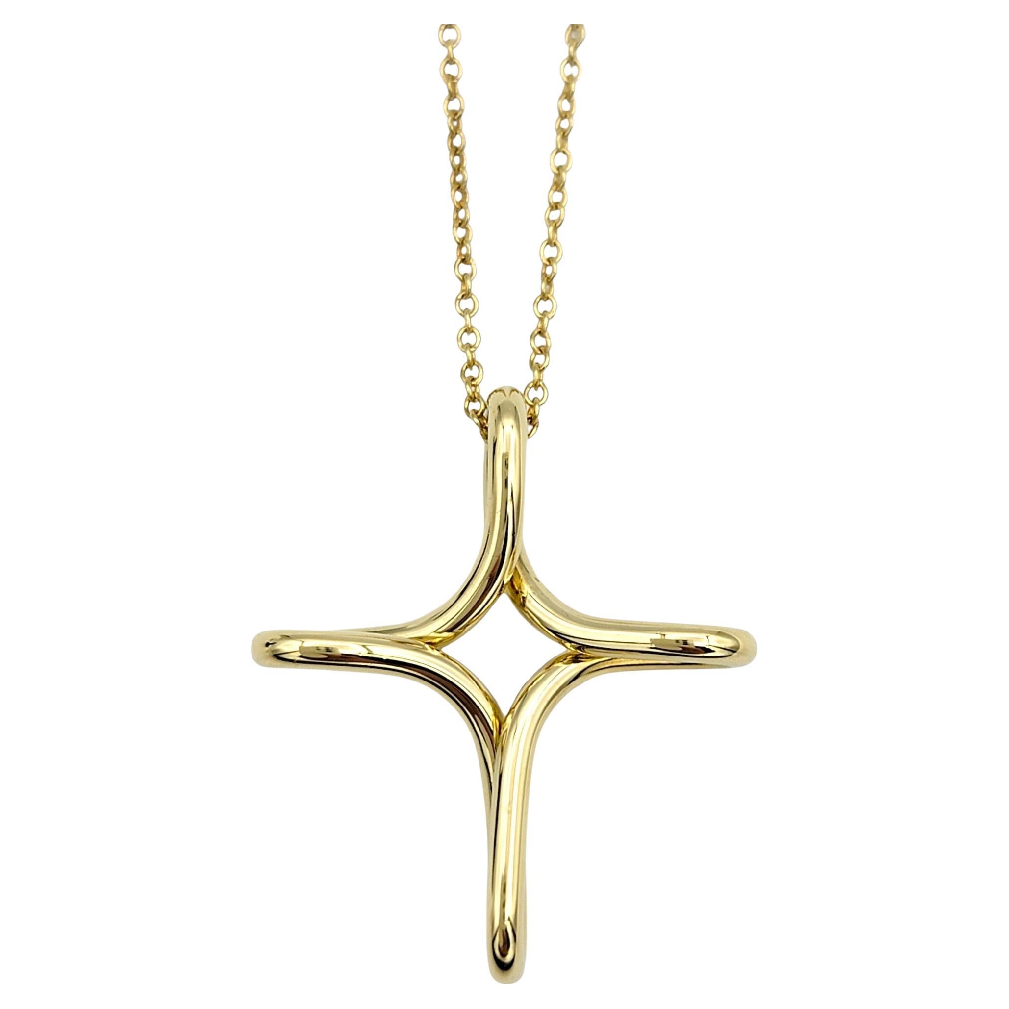 Tiffany & Co. Elsa Peretti Infinity Cross Pendant Necklace, 18 Karat Yellow Gold