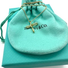Tiffany & Co. Elsa Peretti Infinity Cross Pendant Necklace in 18k Yellow Gold